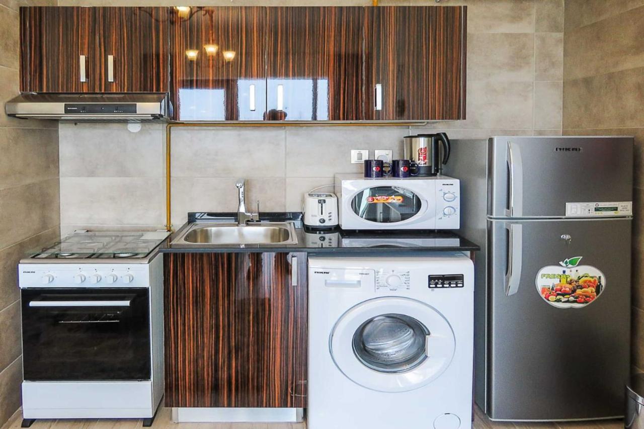 Oyo 860 Studio Apartment, Maya Tower 4, Jumeirah Village Triangle Dubai Ngoại thất bức ảnh