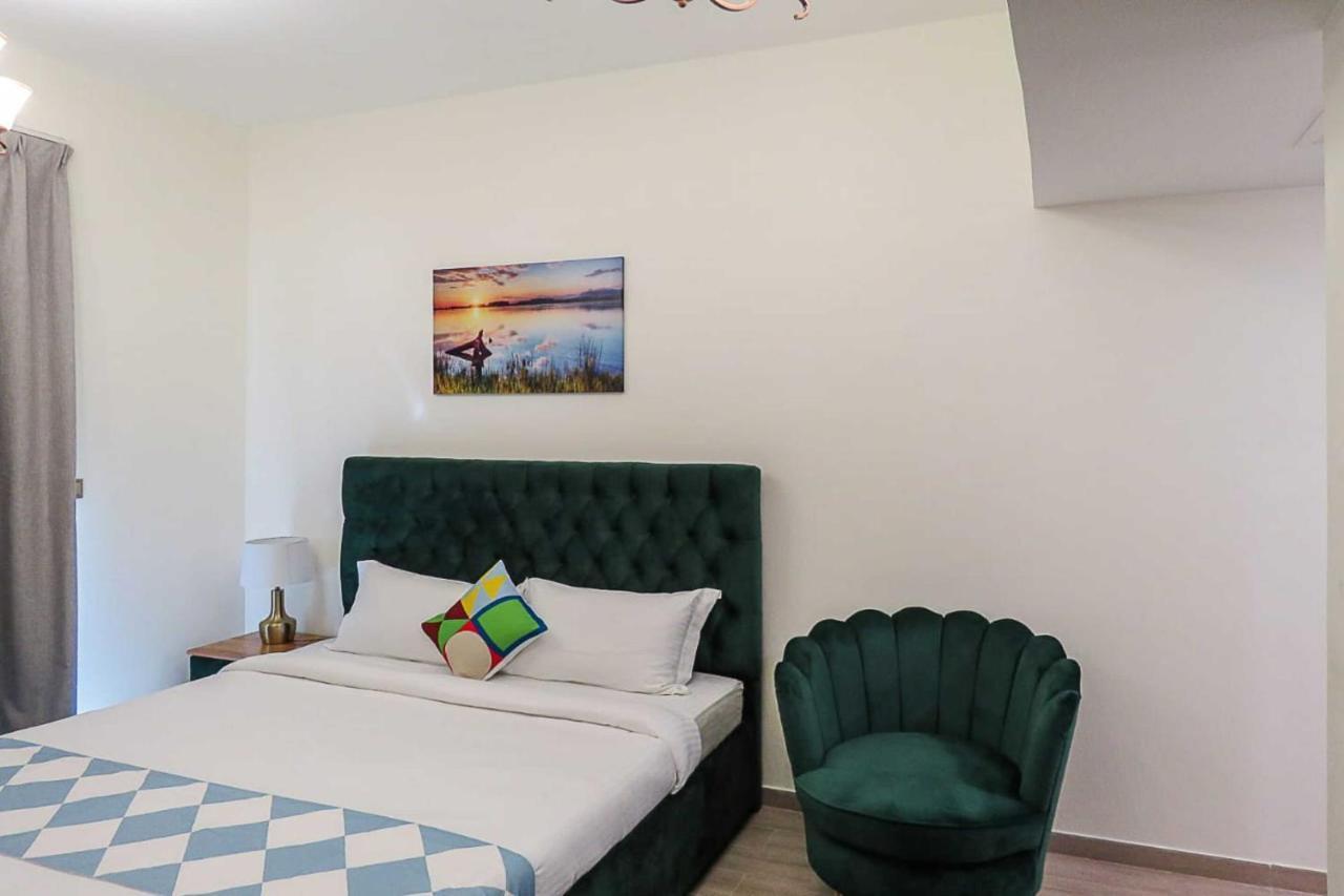 Oyo 860 Studio Apartment, Maya Tower 4, Jumeirah Village Triangle Dubai Ngoại thất bức ảnh