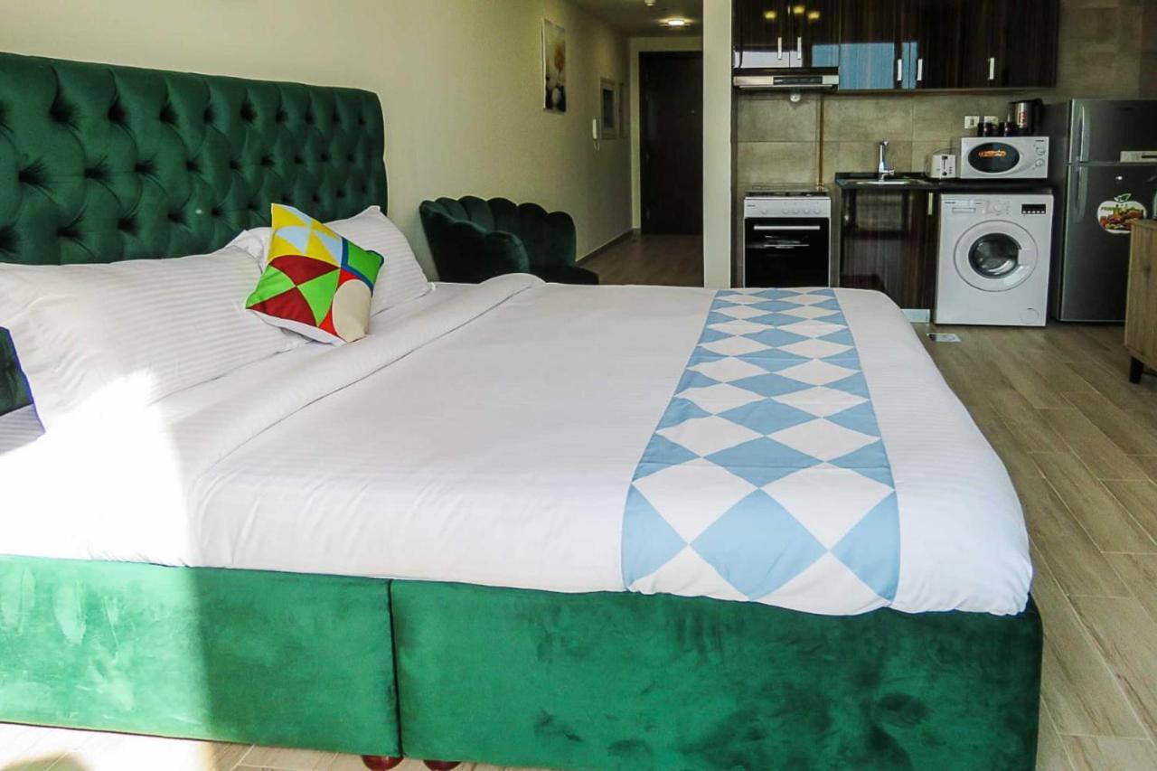 Oyo 860 Studio Apartment, Maya Tower 4, Jumeirah Village Triangle Dubai Ngoại thất bức ảnh